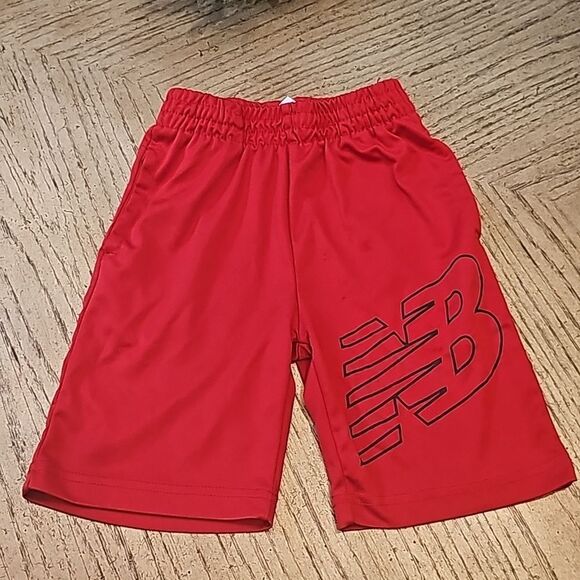 Red athletic shorts New Balance size M 5/6 - Picture 1 of 7